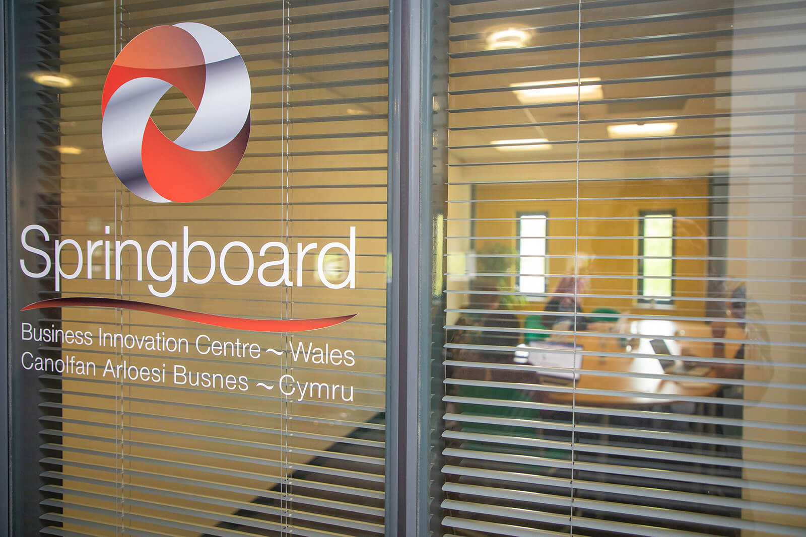 Springboard - Looking through the window into a meeting room